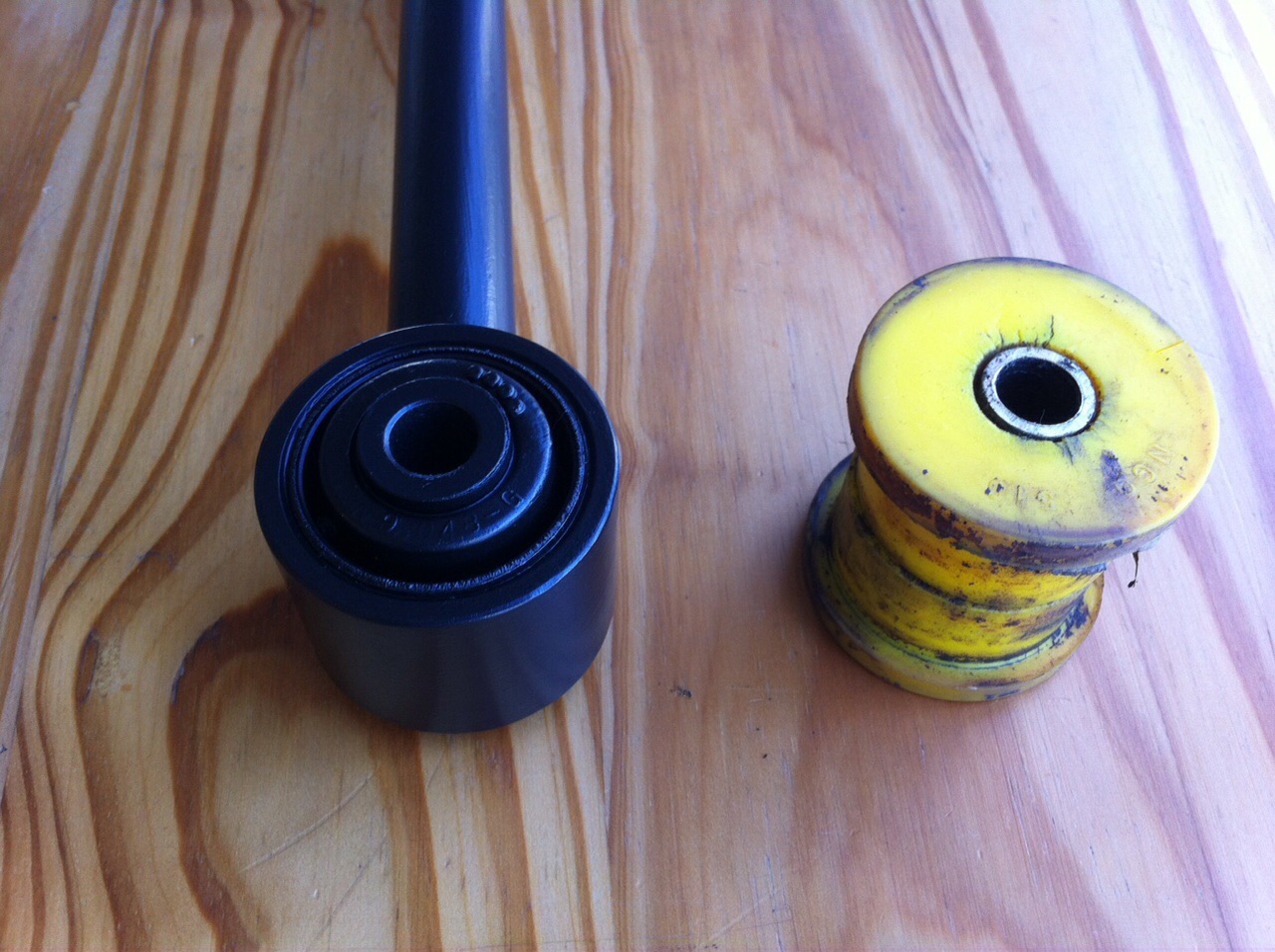 New rubber and old worn poly bushes