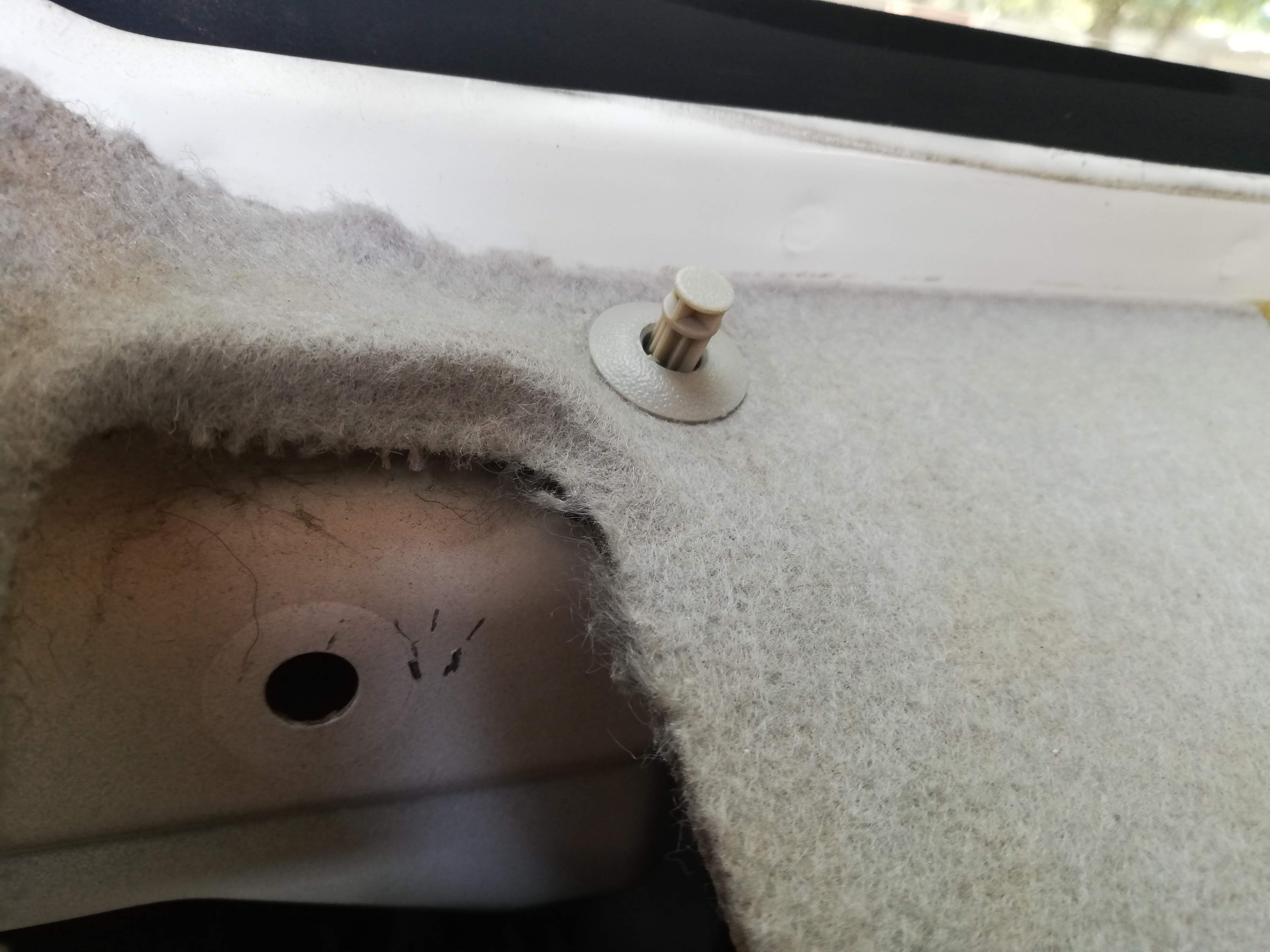 Bottom trim clip removal up close.