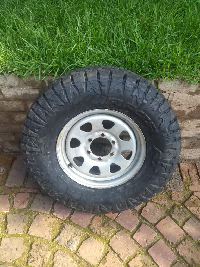 Patrol sparewheel with new MaxxisRazr.jpeg