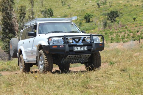 Troll in it's natural inhabitat - note the latest mods, GY 33&quot; Muds, PC Bash plates and side awning