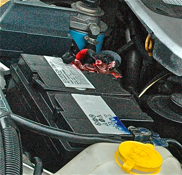 Battery hold-down clamp missing