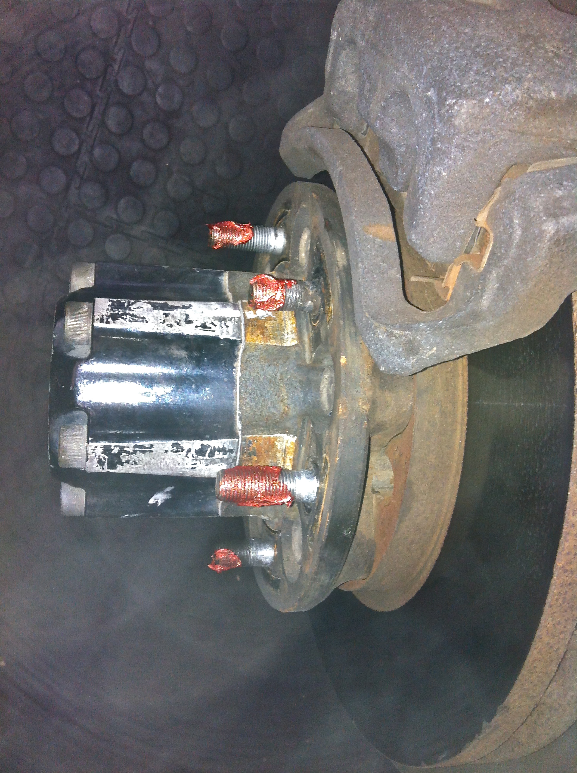 On balancing the un-balanced tyres (as handed over to me) - The different length wheel studs were spotted