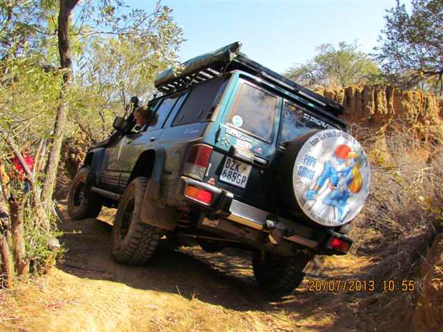 delicately working around the rocks, trees and sand walls....this was VERY tight